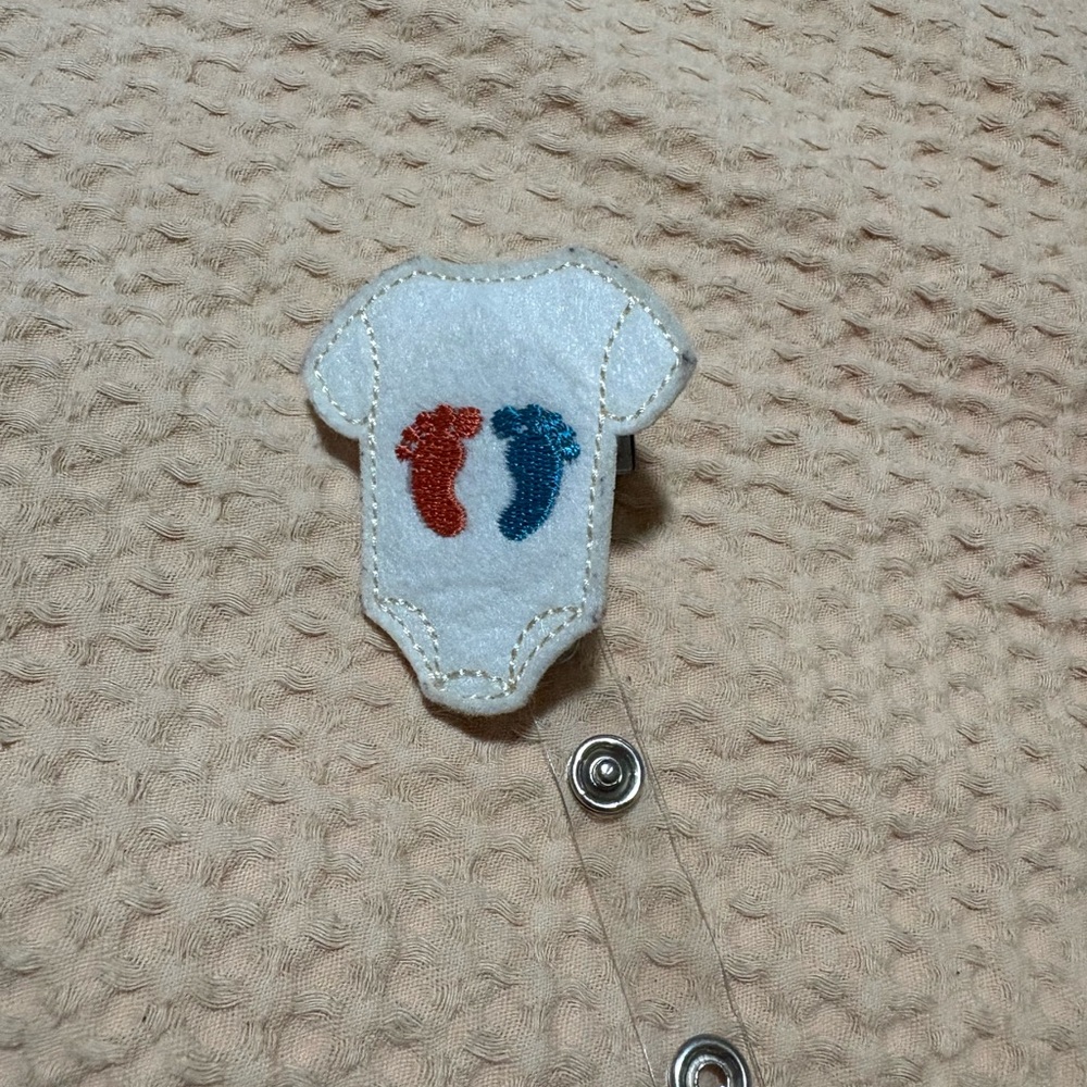 Baby Onesie Badge Reel with Footprint Design